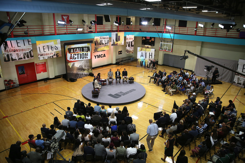 The final panel during "An Undefeated Conversation: Athletes, Responsibility, and Violence" on Thursday at the South Side YMCA in Chicago. Dwyane Wade appeared via satellite. (Credit (Brent Lewis/The Undefeated)